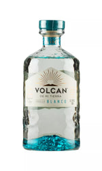 Sleek 70cl bottle of Volcan De Mi Tierra Blanco Tequila, 40% ABV, with a modern volcanic design. This clear tequila offers a fresh, agave-forward flavor with citrus notes.